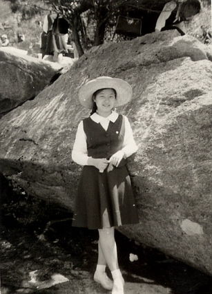 Having a picture taken in her Sacred Heart Girls�� Middle School uniform