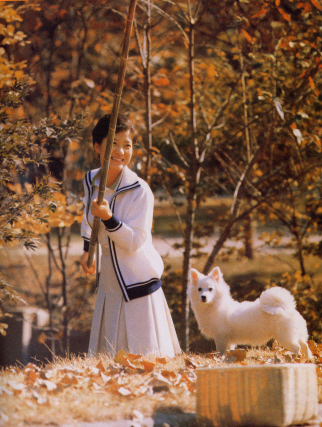 With her dog on the grounds of Cheong Wa Dae
